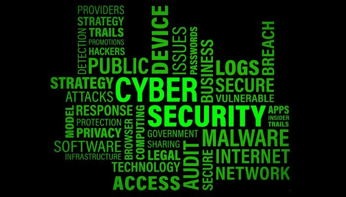 Cybersecurity basics for beginners - person using laptop with shield and lock icons representing online safety and protection